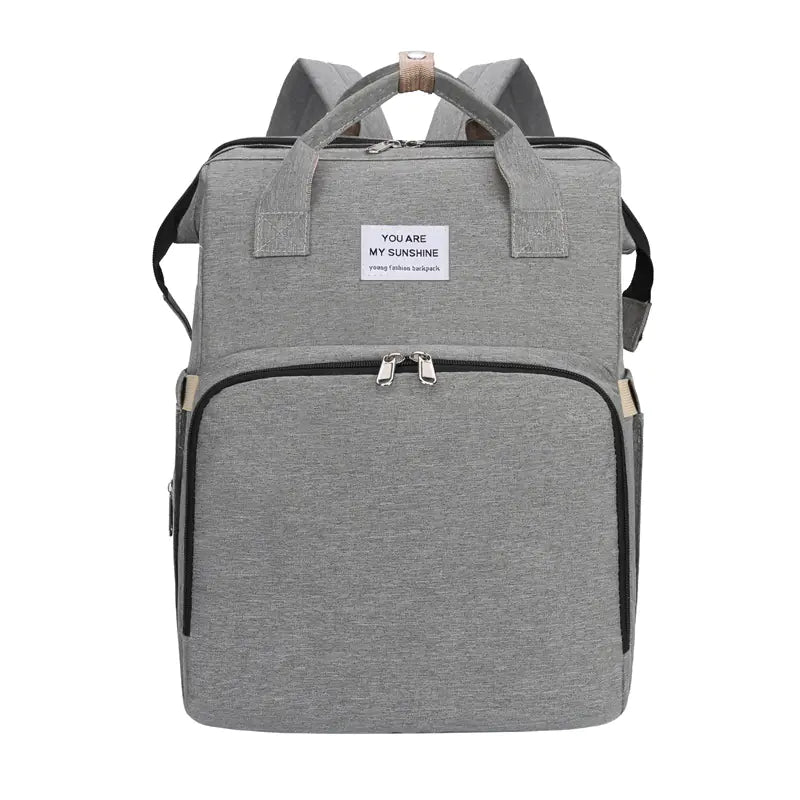 SleepNest™ – Premium All-in-One Diaper Bag & Bed